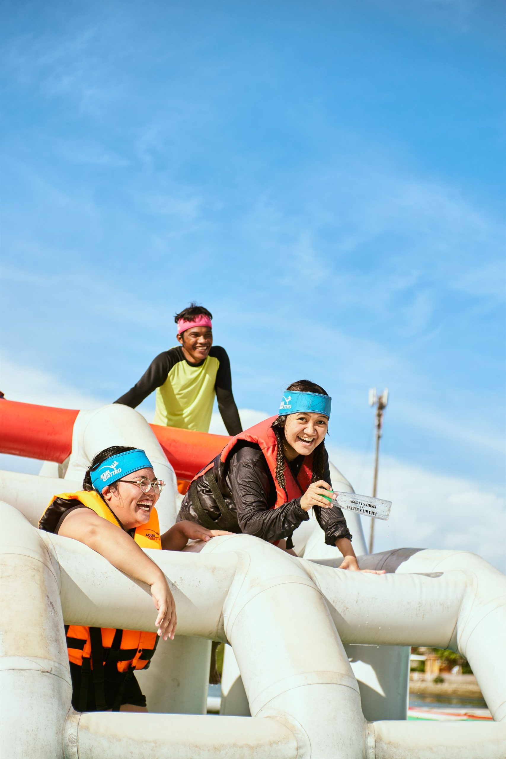 Kids racing through an inflatable obstacle course