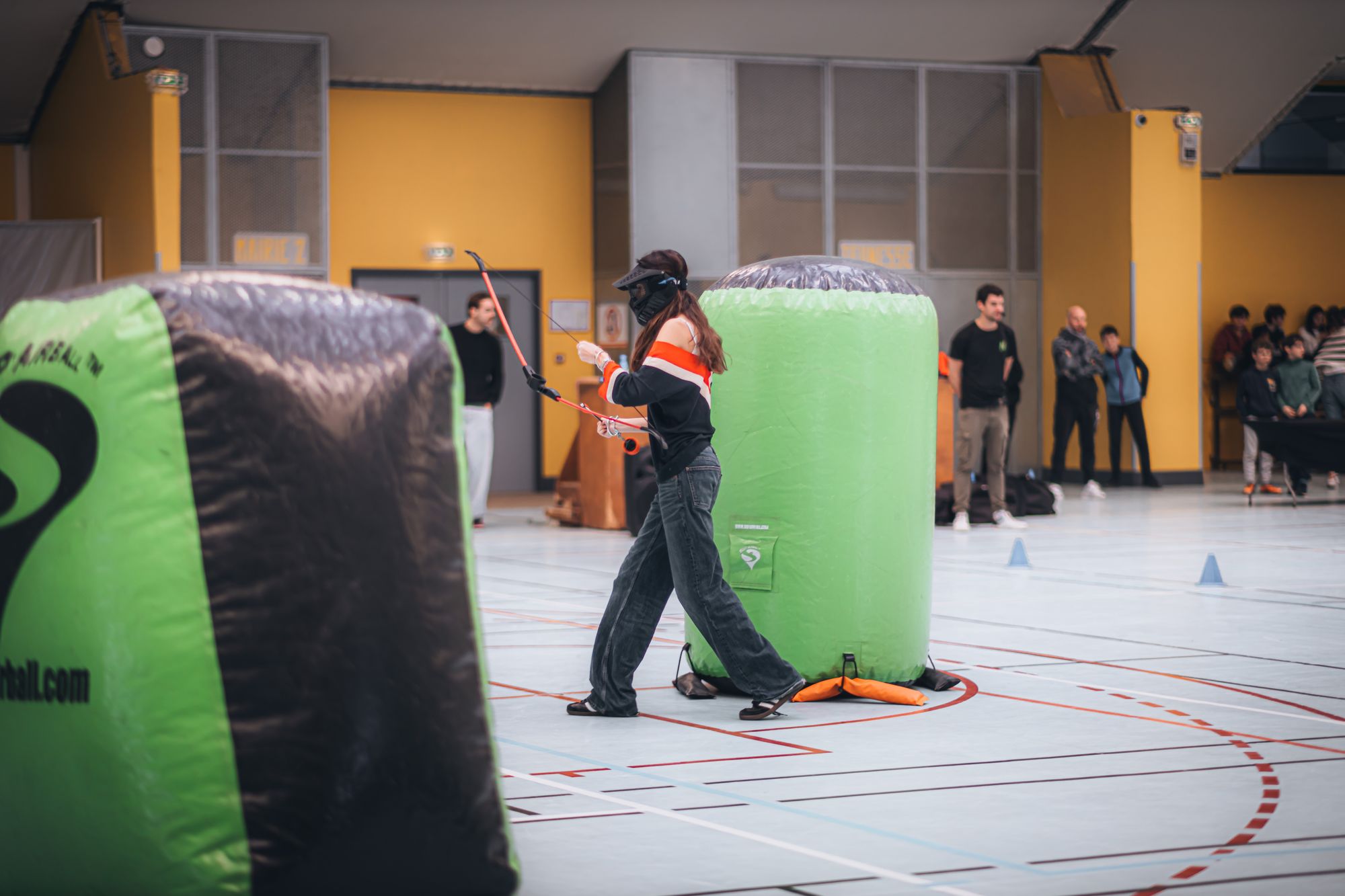 Kids playing an inflatable tag game