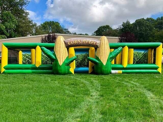 A corn-maze inflatable with giant corn cobs