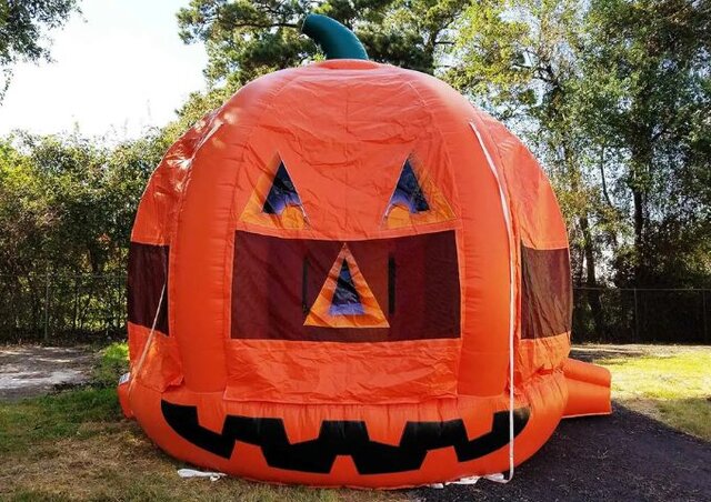 A giant jack-o’-lantern bounce house
