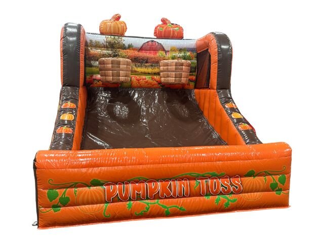 A pumpkin toss inflatable game