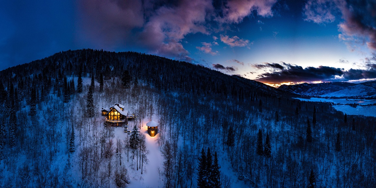 A snowy valley at dusk